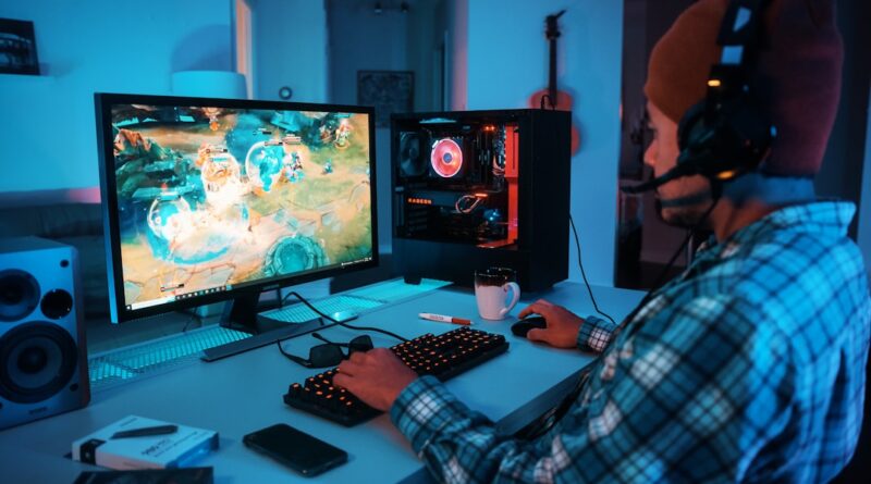 a person wearing headphones and using a computer